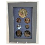 1986 Prestige Ellis Island Silver Proof set 7 coins - plastic case only, no COA, smoke damage on nearly all coins except silver dollar
