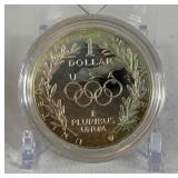 1988 S-Olympic Commemorative Silver Dollar - just the coin in a protective plastic case