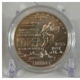 1991 D-Korean War Memorial Silver Dollar - just the coin in a protective plastic case
