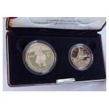 1992 Columbus Quincentenary 2 coin proof set - case is fire damaged, no COA but coins appear to be in good shape