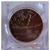 1992 P-Olympic Gymnastics Commemorative Clad Uncirculated Half Dollar - just the coin in a protective plastic case