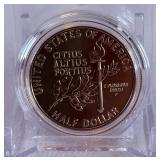 1992 P-Olympic Gymnastics Commemorative Clad Uncirculated Half Dollar - just the coin in a protective plastic case