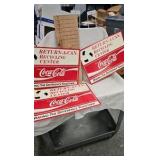 Lot of Coca Cola Recycling Advertising Signs