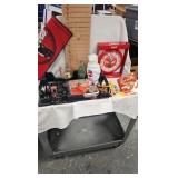 Coke Clock, Goblet, Tin, and Books