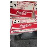 Lot of Coca Cola Recycling Advertising Signs