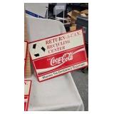 Lot of Coca Cola Recycling Advertising Signs