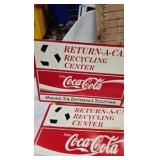 Lot of Coca Cola Recycling Advertising Signs