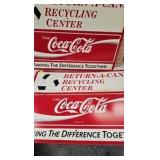 Lot of Coca Cola Recycling Advertising Signs
