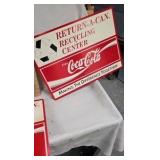 Lot of Coca Cola Recycling Advertising Signs