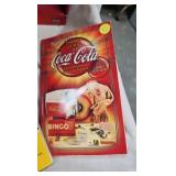 Coke Clock, Goblet, Tin, and Books