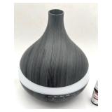 Like New Essential Oils Diffuser with Three Essential Oils (Over Half Full)