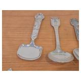 Lot of (8) 204-grams (total) 40G Silverplated Souvenir Spoons