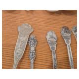 Lot of (13) 189-grams (total) 40G Silverplated Souvenir Spoons