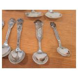 Lot of (13) 189-grams (total) 40G Silverplated Souvenir Spoons