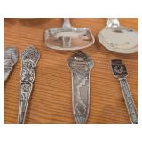 Lot of (13) 189-grams (total) 40G Silverplated Souvenir Spoons