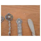 Lot of (13) 189-grams (total) 40G Silverplated Souvenir Spoons