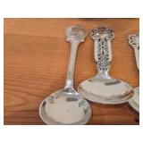 Lot of (9) 207-grams (total) 40G Silverplated Souvenir Spoons