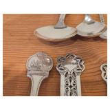 Lot of (9) 207-grams (total) 40G Silverplated Souvenir Spoons