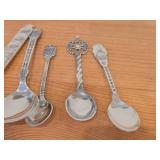 Lot of (9) 207-grams (total) 40G Silverplated Souvenir Spoons