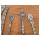 Lot of (9) 207-grams (total) 40G Silverplated Souvenir Spoons
