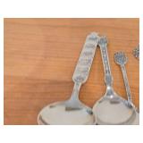 Lot of (9) 207-grams (total) 40G Silverplated Souvenir Spoons