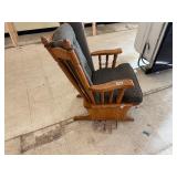Wooden rocking chair with cushions