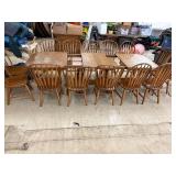 Large dining room table with 4 inserts and 14 chairs