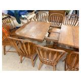 Large dining room table with 4 inserts and 14 chairs