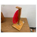 Number wheel spinner on wooden base
