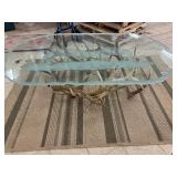 Glass Top Coffee table with authentic antler base. Buck scene etching on top
