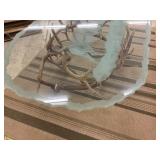 Glass Top Coffee table with authentic antler base. Buck scene etching on top