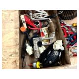 Assortment of garage items including spent shells belt