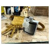 Assorted contents with flask and skin carrier
