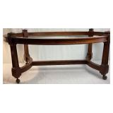 Gabberts Wooden Coffee Table on Wheels with Oval Glass Top