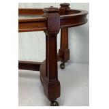 Gabberts Wooden Coffee Table on Wheels with Oval Glass Top