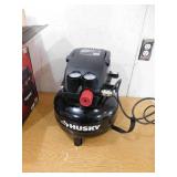 Husky 3 Gal. 120 PSI Portable Electric Oil-Free Light Duty Pancake Air Compressor with Fold Down Handle and 1-Quick Coupler