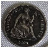 1860 Seated Liberty Half Dime, Type 4, with a legend on the obverse.