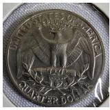 Two Washington quarters from 1964-D and 1965.