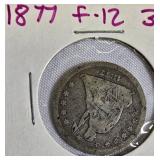 1877 Seated Liberty Quarter.