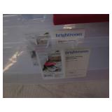 2 Under bed storage totes, one has ...