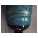 2 Bottles of shampoo (leaking) and ...