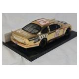 Rusty Wallace Miller Lite Ford Taurus – Gold Chrome Diecast on Black Base
