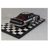 Dale Earnhardt Sr. Goodwrench Monte Carlo – Black Diecast "Number Seven" Win Replica on Checkered Base