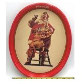 Vintage Coca-Cola Santa Tray – Red Metal Oval with Santa Holding Coke & Toys