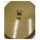 Vintage Coca-Cola Santa Tray – Red Metal Oval with Santa Holding Coke & Toys