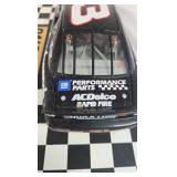 Dale Earnhardt Sr. Goodwrench Monte Carlo – Black Diecast "The 500" Daytona Win Replica on Checkered Base