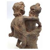 19th-century Renaissance-style terracotta sculpture depicting two huddled cherubs
