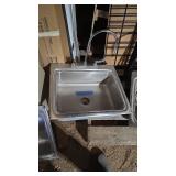 Stainless steel sink with faucet