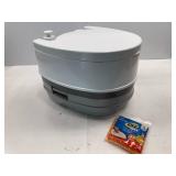 CAMCO TRAVEL TOILET