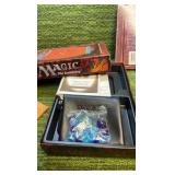 1995 Magic The Gathering "Revised" Box containing players guide, with stone pieces, and Magic bag